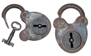two old padlocks and a key
