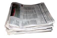 Small pile of broadsheet newspapers